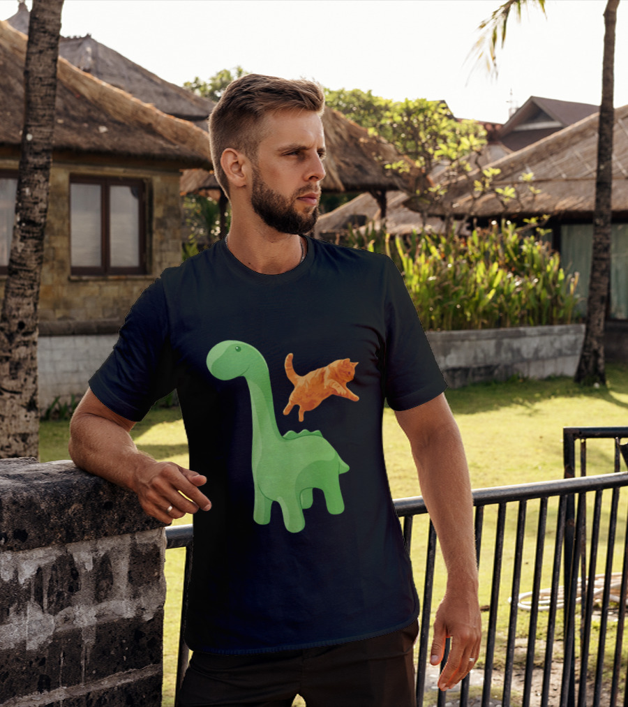 Cat Jumping Over Green Dinosaur Cartoon Image T-Shirt