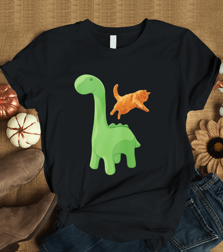 Cat Jumping Over Green Dinosaur Cartoon Image T-Shirt