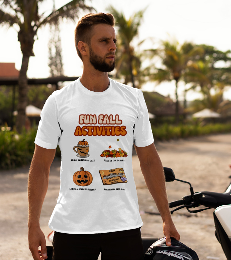 Fun Fall Activities Halloween Drink Something Cozy Ouija Board Carve A Jack O Lantern Play In The Leaves T-Shirt