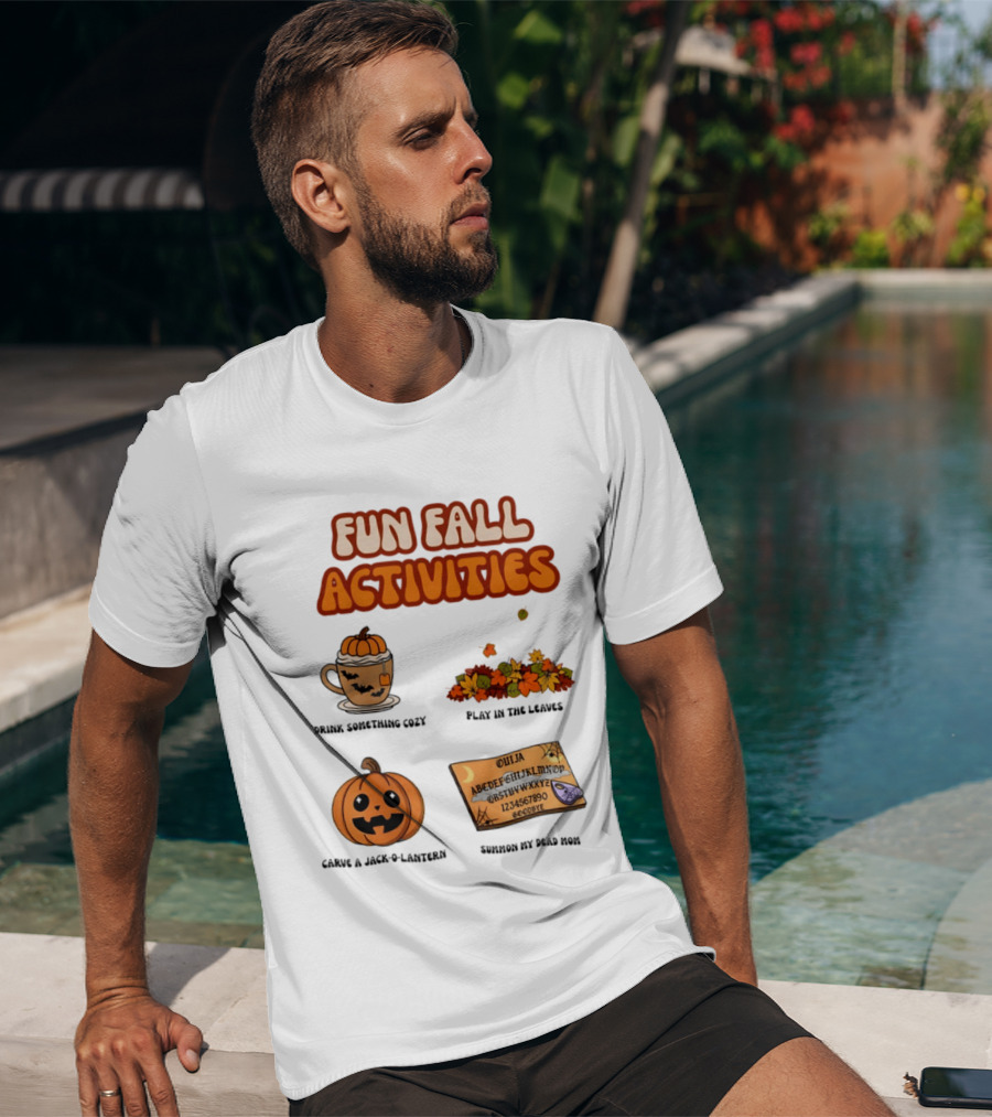 Fun Fall Activities Halloween Drink Something Cozy Ouija Board Carve A Jack O Lantern Play In The Leaves T-Shirt