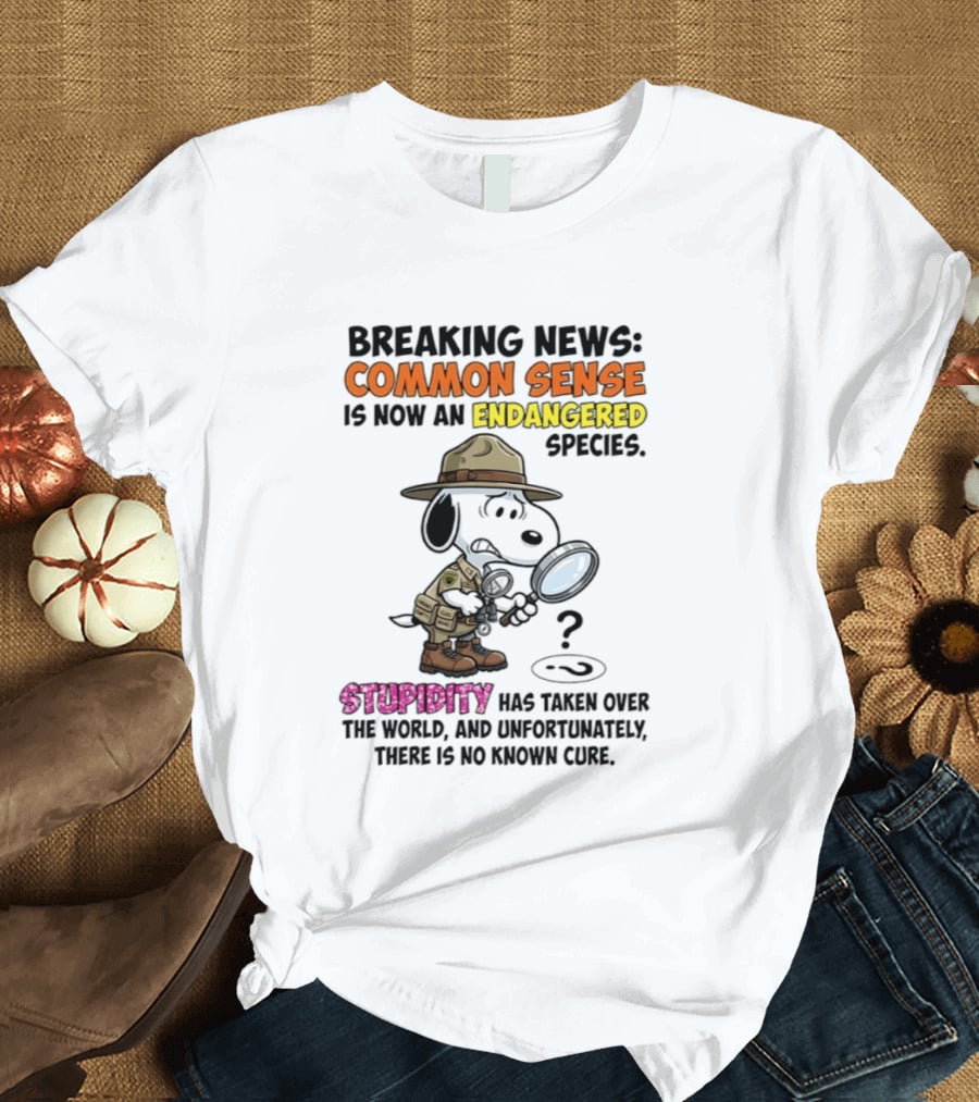 Breaking News Common Sense Endangered Species Stupidity Taken Over Snoopy T-Shirt