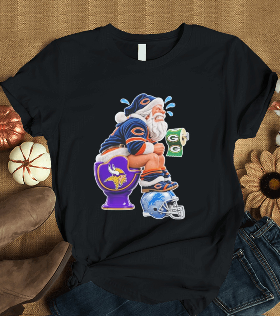 Santa Claus On Toilet Minnesota Vikings Detroit Lions Green Bay Packers Chicago Bears Funny Christmas 2026 Football T-Shirt