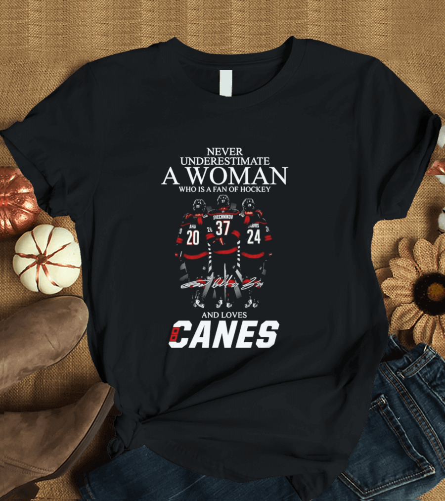 Never Underestimate A Woman Who Is A Fan Of Hockey And Loves Canes T-Shirt
