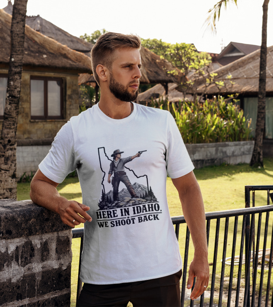 Here In Idaho We Shoot Back Cowboy With Pistol In State Mountains Scene T-Shirt
