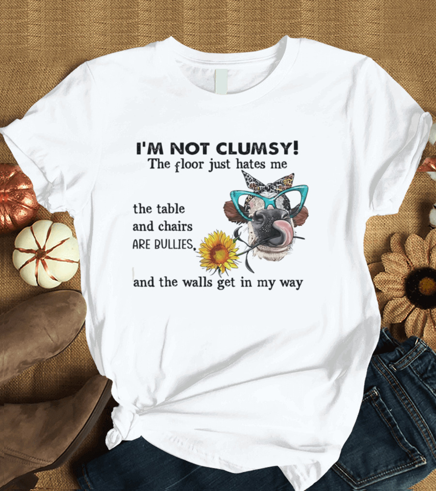 I'm Not Clumsy The Floor Hates Me The Table Chairs Bullies Walls Get In My Way Cow Sunflower Butterfly Glasses Tongue Out T-Shirt