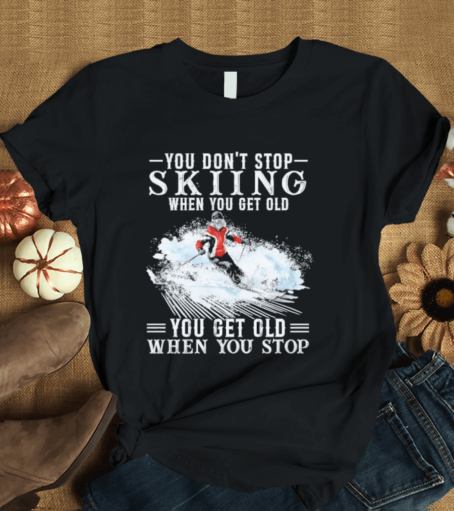 You Don't Stop Skiing When You Get Old You Get Old When You Stop Older Woman Skier Spraying Snow T-Shirt