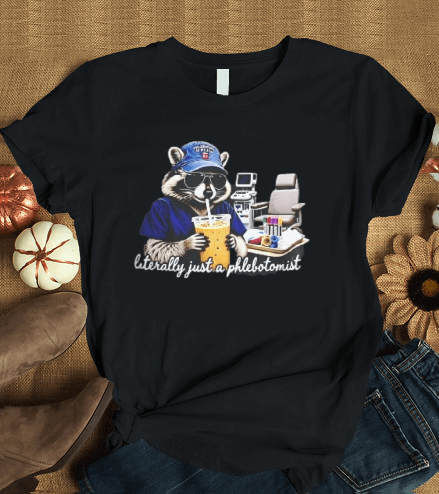 Raccoon Phlebotomist In Scrubs Sipping Drink With Blood Collection Tubes T-Shirt