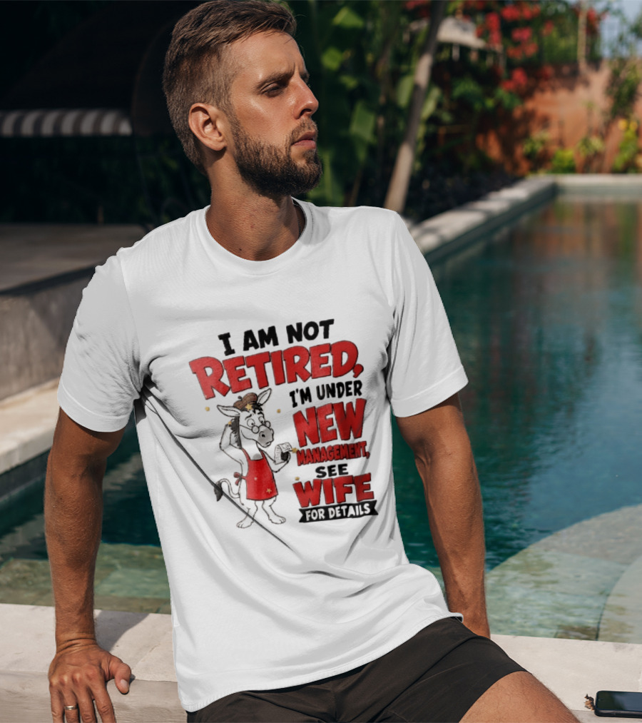 I Am Not Retired I'm Under New Management See Wife For Details Cartoon Donkey Red Apron T-Shirt
