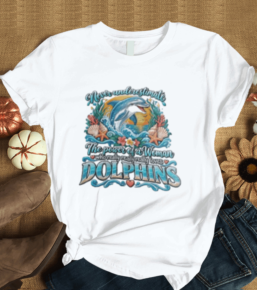 Never Underestimate The Power Of A Woman Who Really Loves Dolphins Ocean Waves Sunburst Shells T-Shirt
