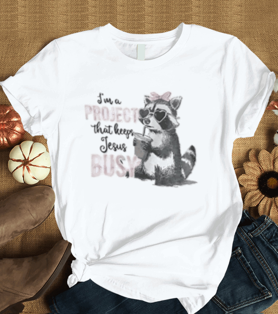 I'm A Project That Keeps Jesus Busy Raccoon Wearing Bow T-Shirt