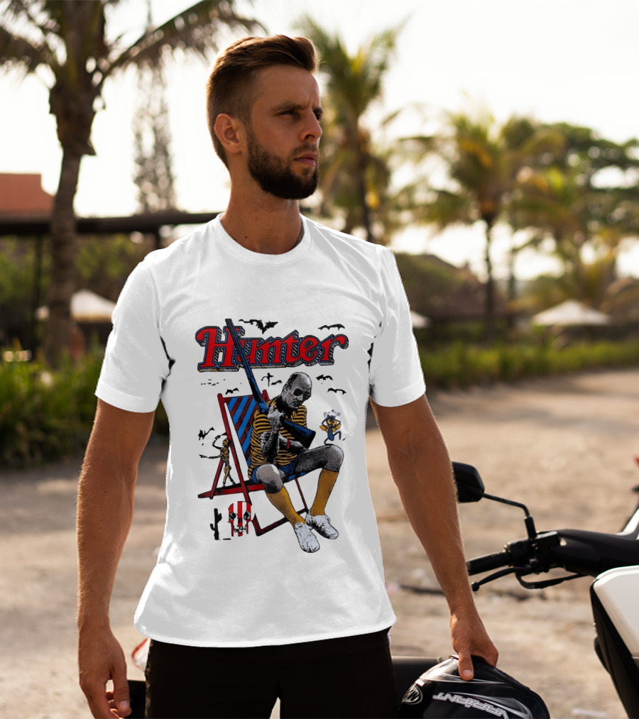 Hunter July 18 1937 February 20 2005 Man Holding Rifle Striped Chair Yellow Socks T-Shirt