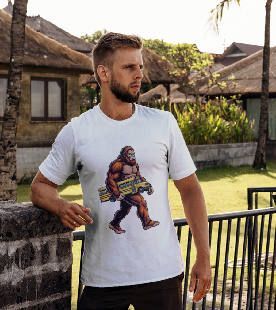 Bigfoot Sasquatch Carrying Yellow School Bus T-Shirt