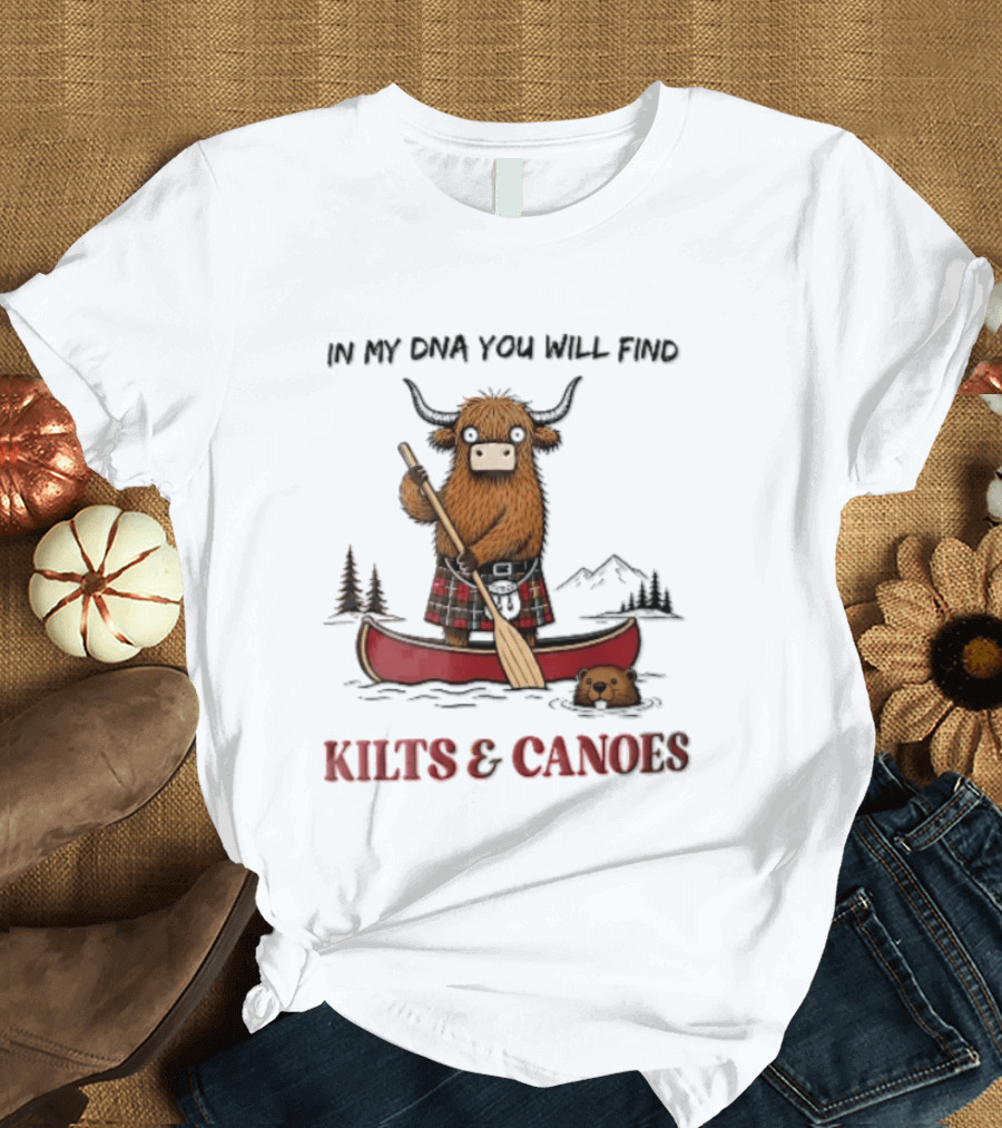 In My DNA You Will Find Kilts And Canoes Cartoon Highland Cow Paddling T-Shirt