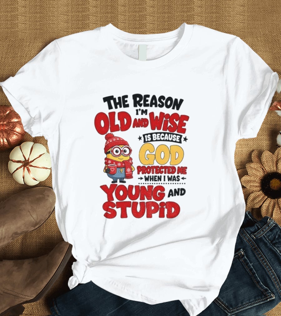 The Reason I'm Old And Wise Is Because God Protected Me When I Was Young And Stupid Minion Winter Outfit T-Shirt