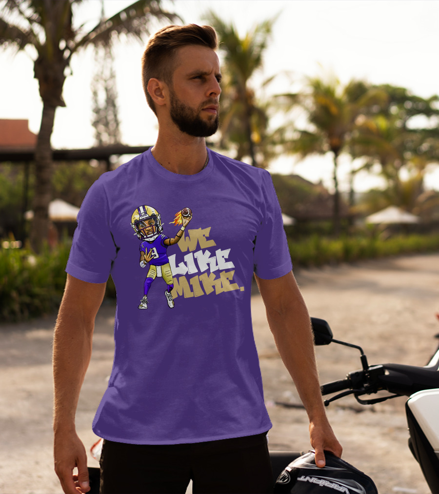 We Like Mike Football Character In Purple And Gold Gear Holding Flaming Ball T-Shirt