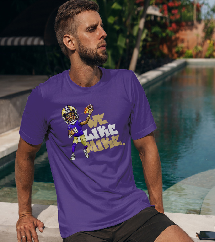 We Like Mike Football Character In Purple And Gold Gear Holding Flaming Ball T-Shirt