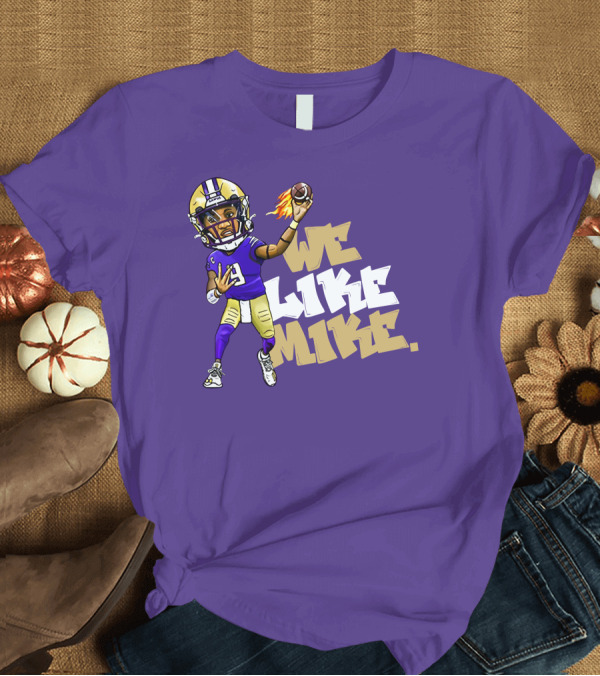 T-Shirt: We Like Mike Football Character in Purple and Gold Gear Holding Flaming Ball T-Shirt We Like Mike Football Character in Purple and Gold Gear Holding Flaming Ball T-Shirt