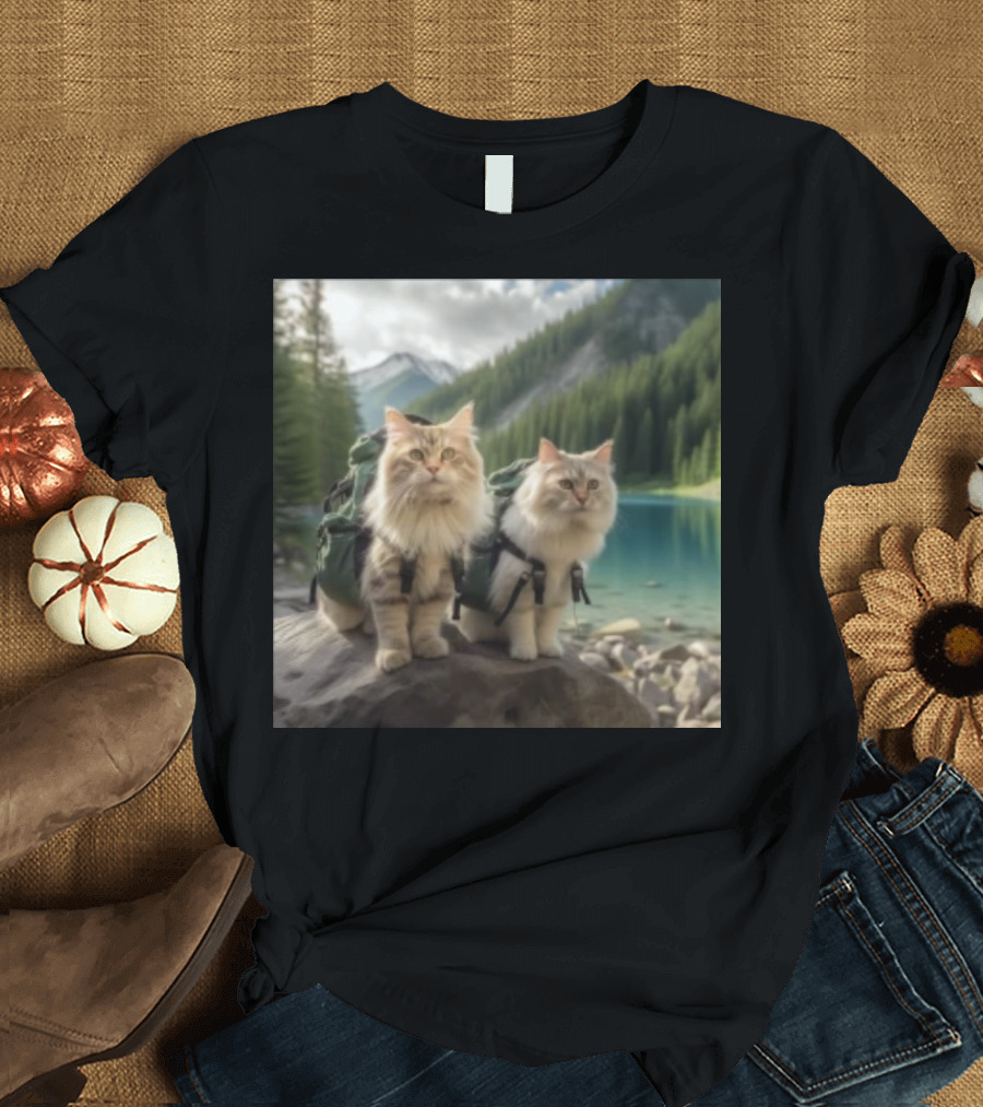 Two American Longhair Cats Are Mountaineering with Backpacks in Scenic Mountain Forest Near Lake T-Shirt