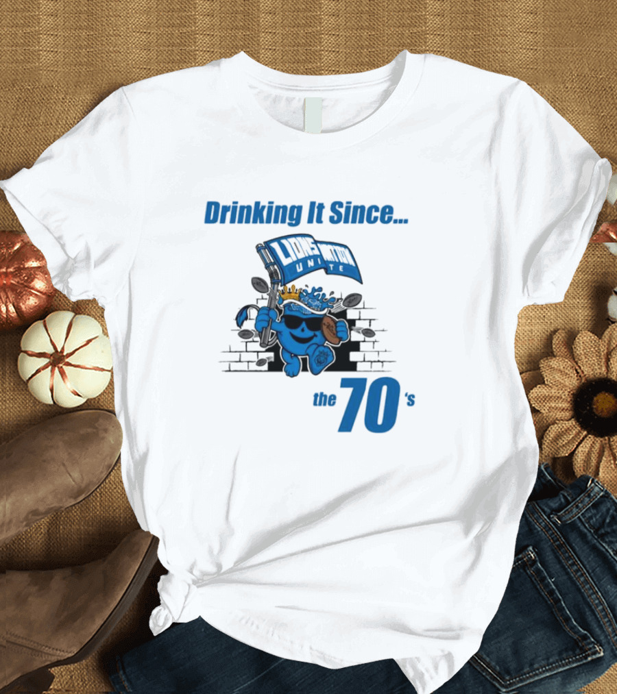 Lions United Drinking It Since the 70’s Fun Character with Flag and Crown T-Shirt