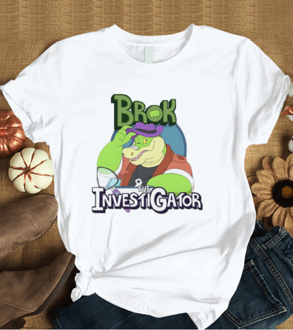T-Shirt: Brok the Investigator Gator Detective with Magnifying Glass and Purple Hat T-Shirt Brok the Investigator Gator Detective with Magnifying Glass and Purple Hat T-Shirt