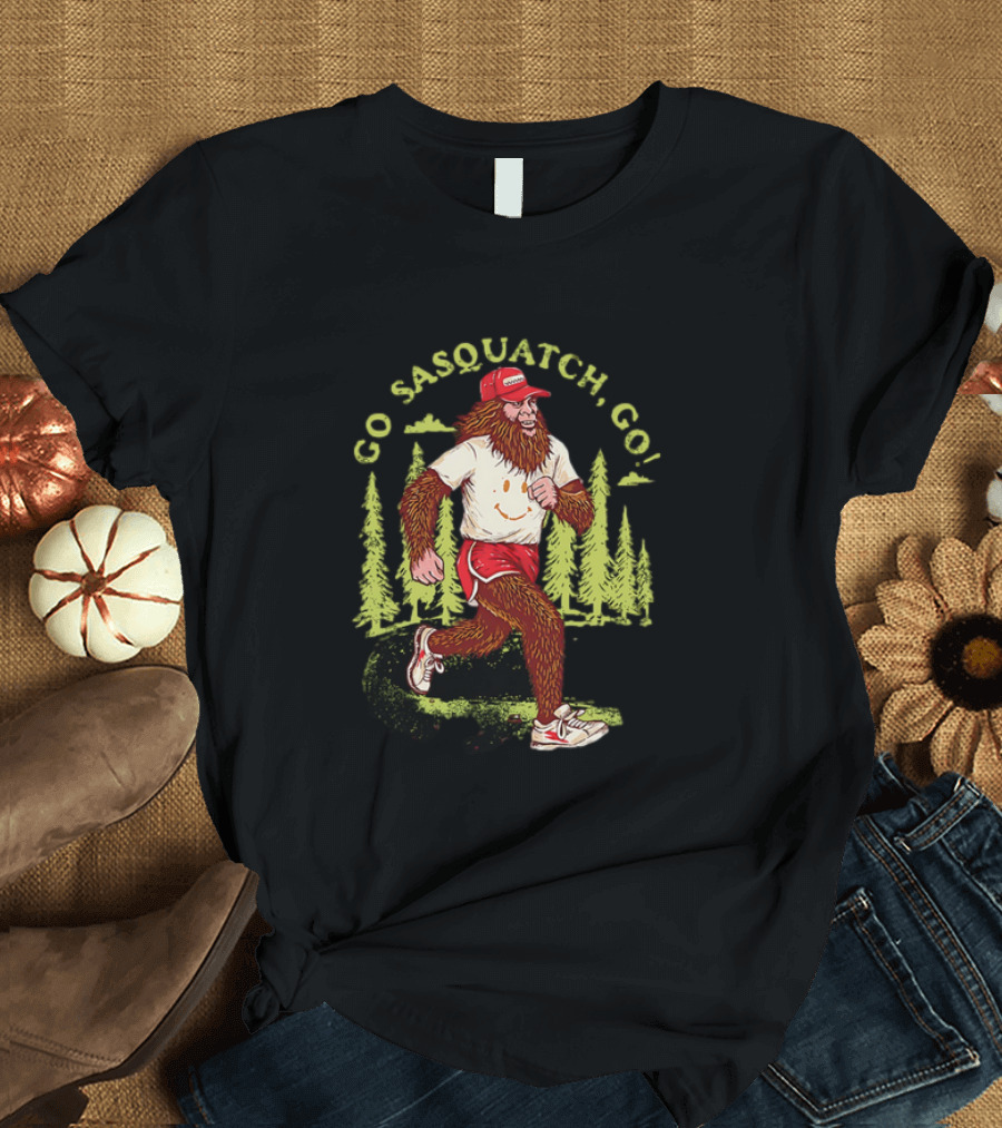 Go Sasquatch Go Bigfoot Jogging in Forest with Red Cap and Sneakers T-Shirt