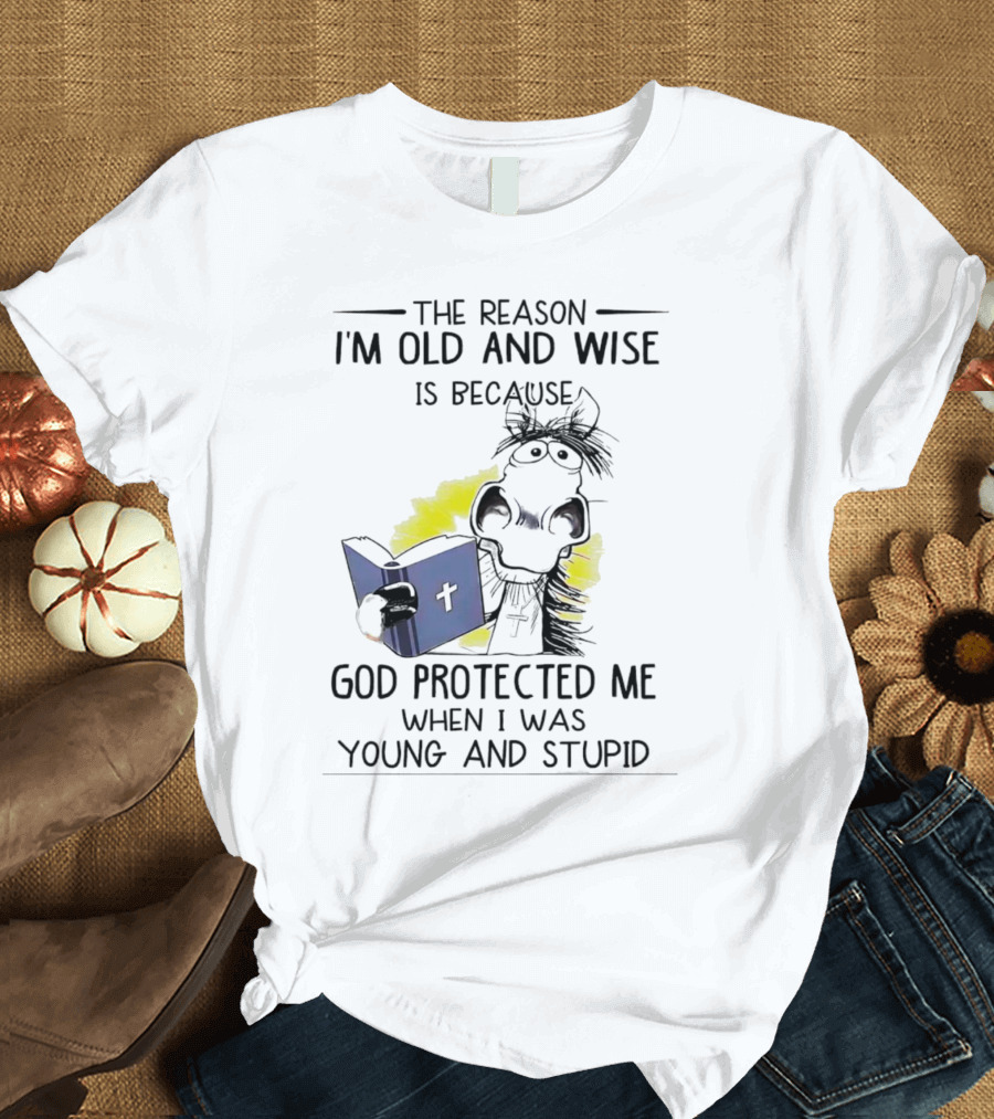 The Reason I'm Old and Wise Is Because God Protected Me When I Was Young and Stupid Cow Cartoon Reading Bible T-Shirt