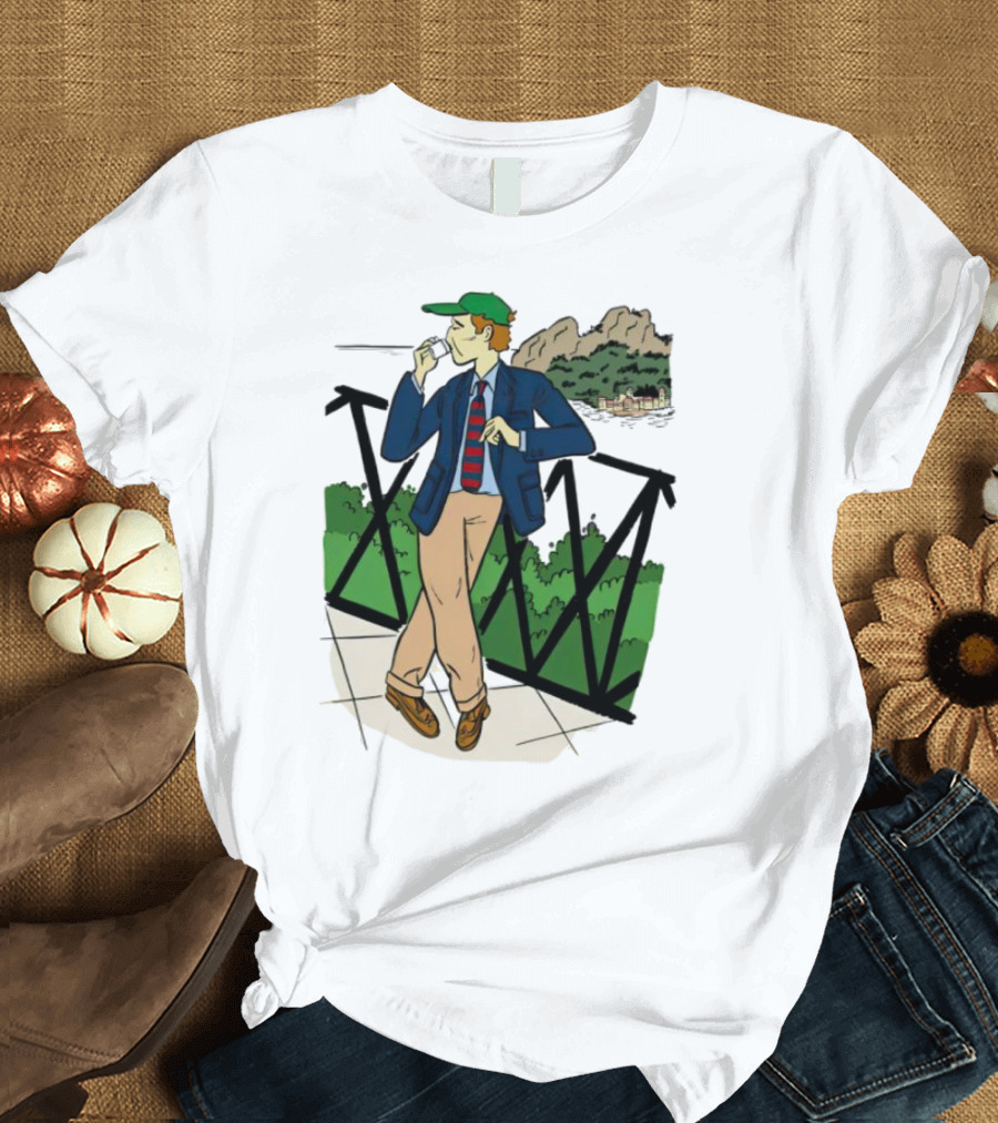 Dick Carroll Roy Rober’s Green Cap and Cityscape Pipe Smoker T-Shirt
