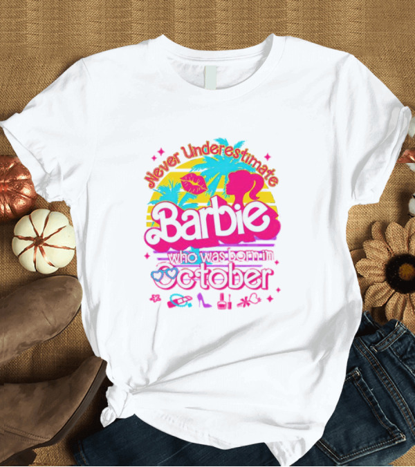 T-Shirt: Never Underestimate Barbie Who Was Born in October with Tropical and Glam Accents T-Shirt Never Underestimate Barbie Who Was Born in October with Tropical and Glam Accents T-Shirt