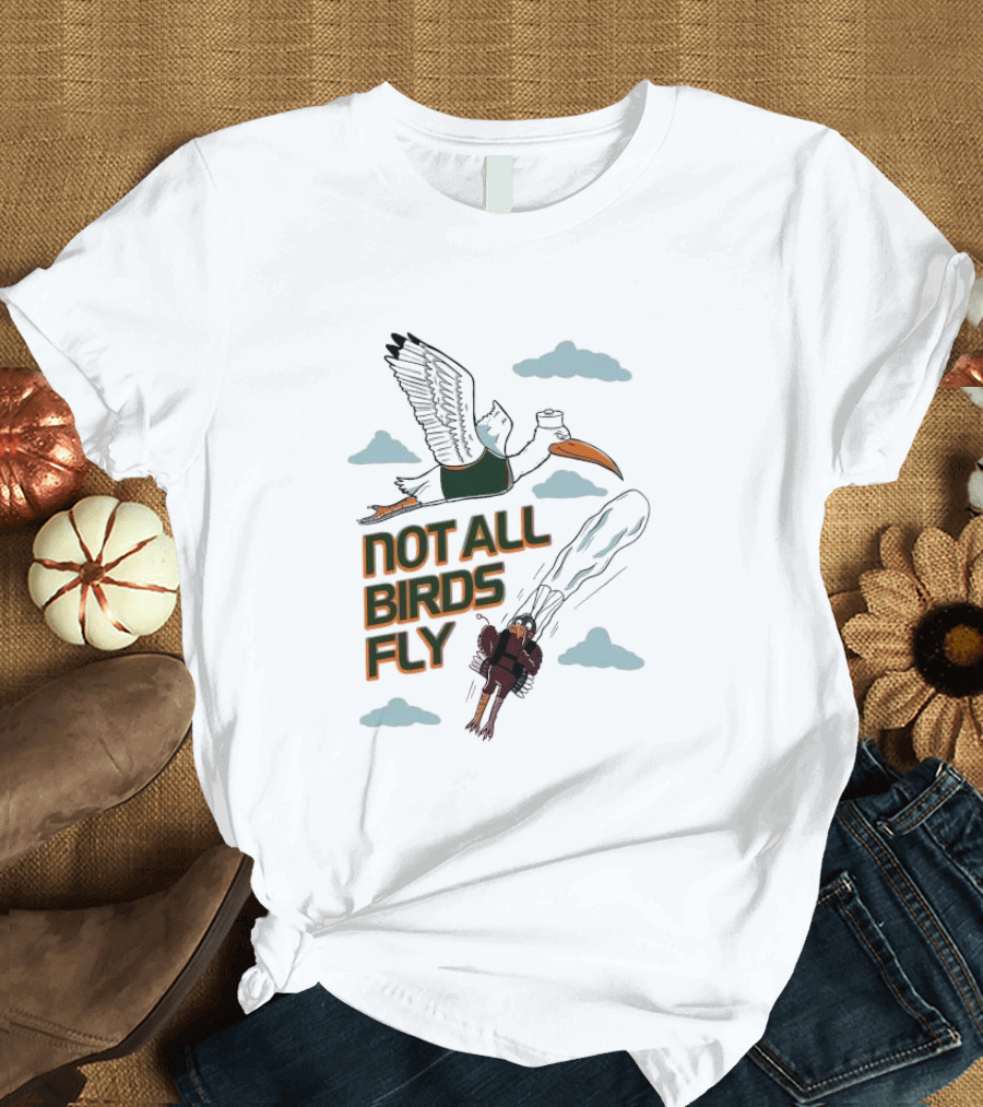 Not All Birds Fly Funny Illustration with Flying Bird and Clouds T-Shirt