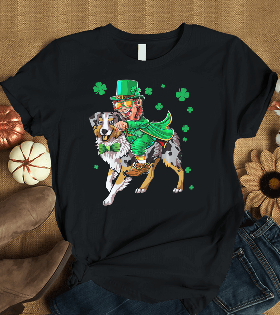 Leprechaun Riding Australian Shepherd with Shamrock Bow Tie and Clover Background T-Shirt
