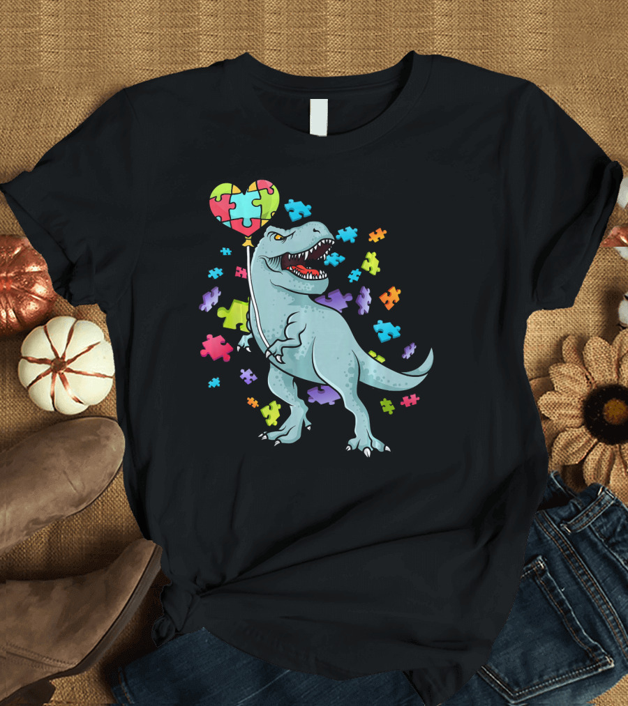 Autism Awareness Dinosaur with Puzzle Heart Balloon and Colorful Puzzle Pieces T-Shirt