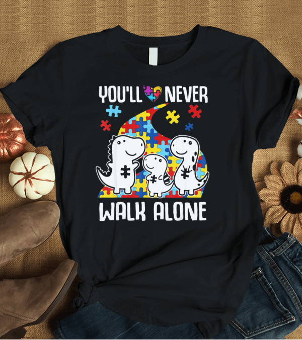 T-Shirt: You'll Never Walk Alone Autism Awareness Puzzle Piece Dinosaurs T-Shirt You'll Never Walk Alone Autism Awareness Puzzle Piece Dinosaurs T-Shirt