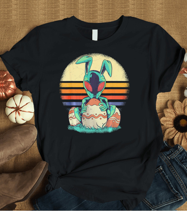 T-Shirt: Easter Alien with Bunny Ears Holding Egg Sunset Stripes T-Shirt Easter Alien with Bunny Ears Holding Egg Sunset Stripes T-Shirt