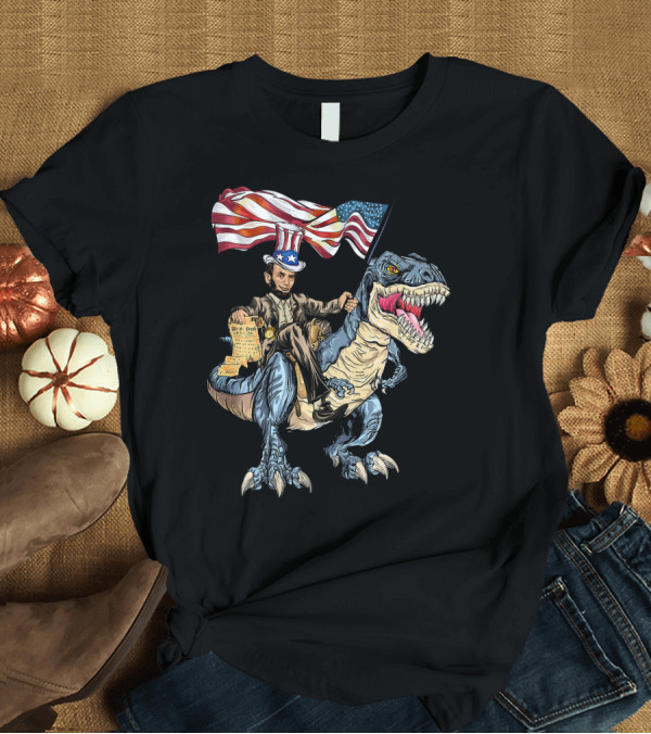 T-Shirt: Abe Lincoln Riding Dinosaur with American Flag and Declaration T-Shirt Abe Lincoln Riding Dinosaur with American Flag and Declaration T-Shirt