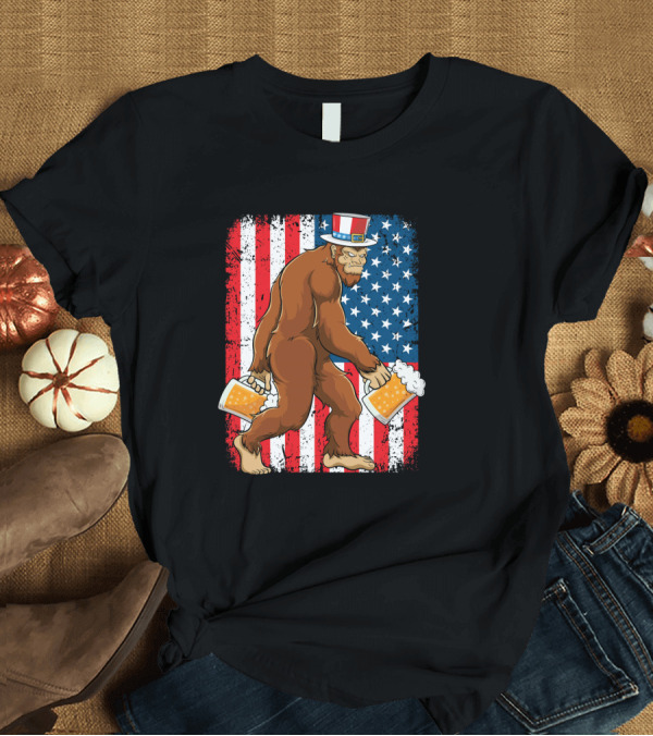 T-Shirt: Bigfoot USA Flag Uncle Sam Hat with Beer T-Shirt Bigfoot USA Flag Uncle Sam Hat with Beer T-Shirt