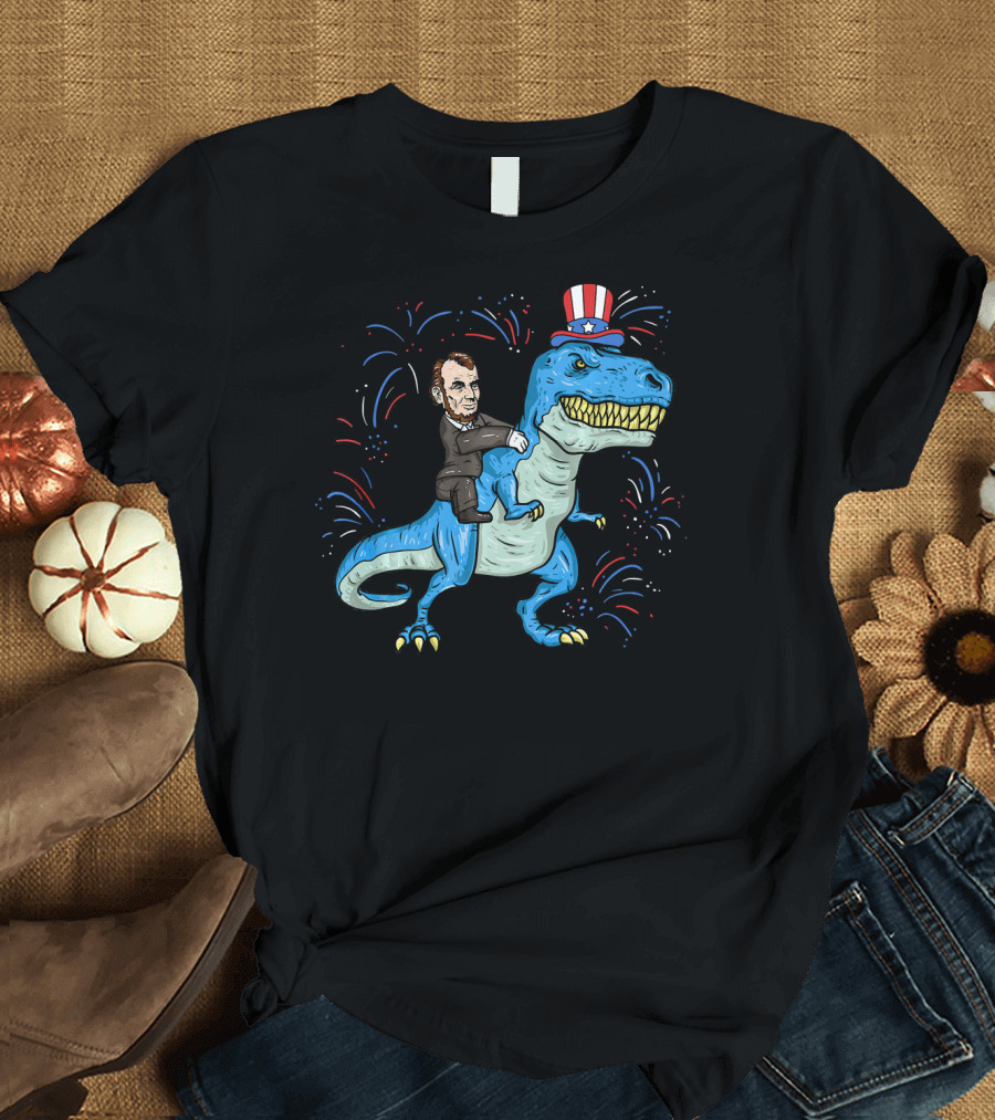 Abe Lincoln Patriotic Dinosaur Riding Fireworks Hat T-Shirt