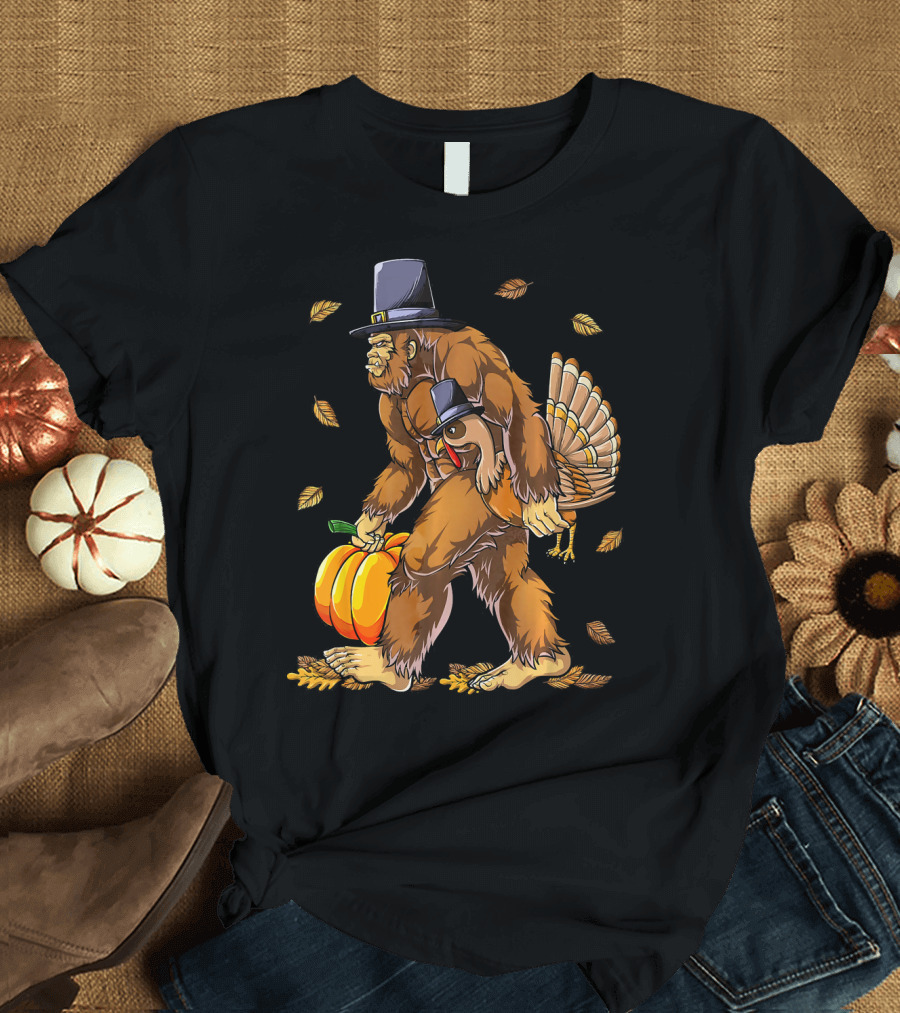 Bigfoot Pilgrim Turkey Carrying Pumpkin Thanksgiving T-Shirt