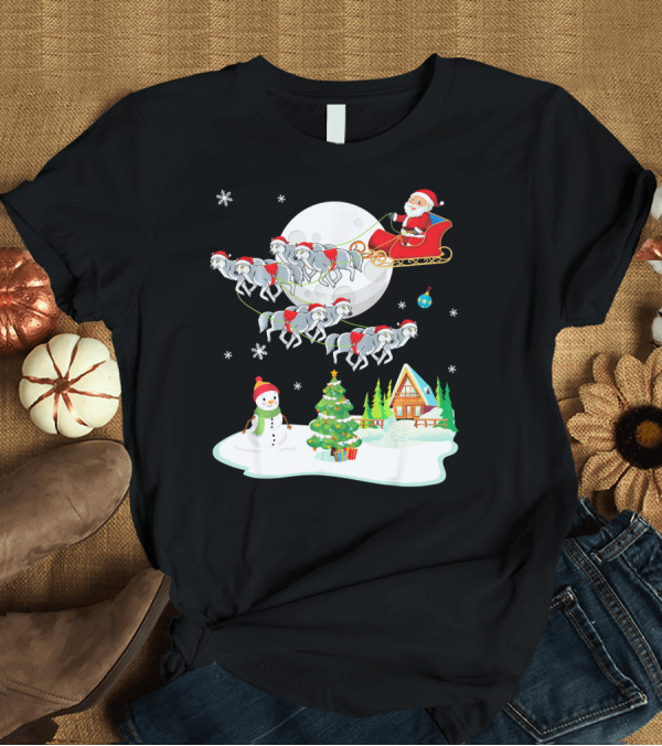 T-Shirt: Santa Claus Sleigh Riding Over Snowman and Christmas Scene with Wolves T-Shirt Santa Claus Sleigh Riding Over Snowman and Christmas Scene with Wolves T-Shirt
