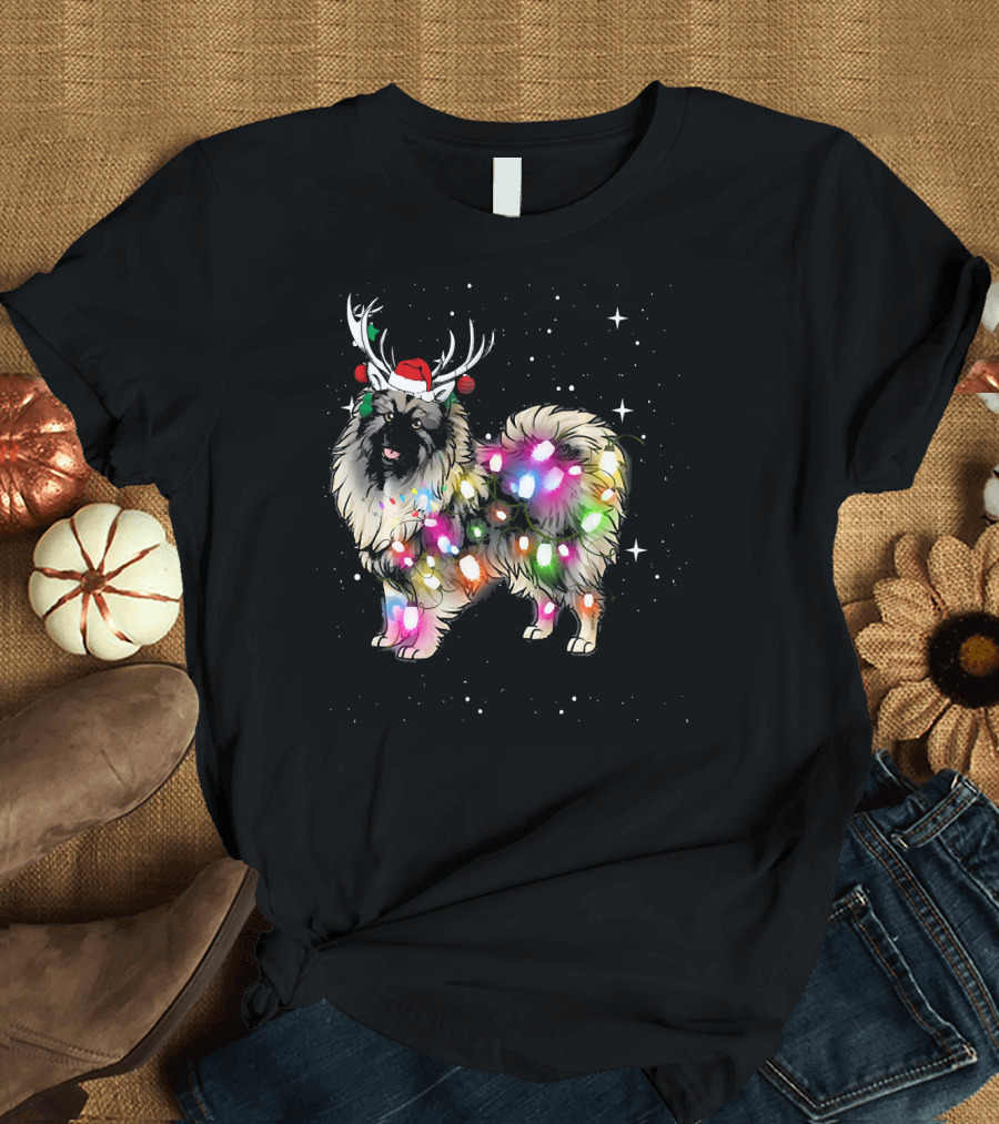Keeshond Dog Wrapped in Christmas Lights Wearing Red Santa Hat and Antlers T-Shirt