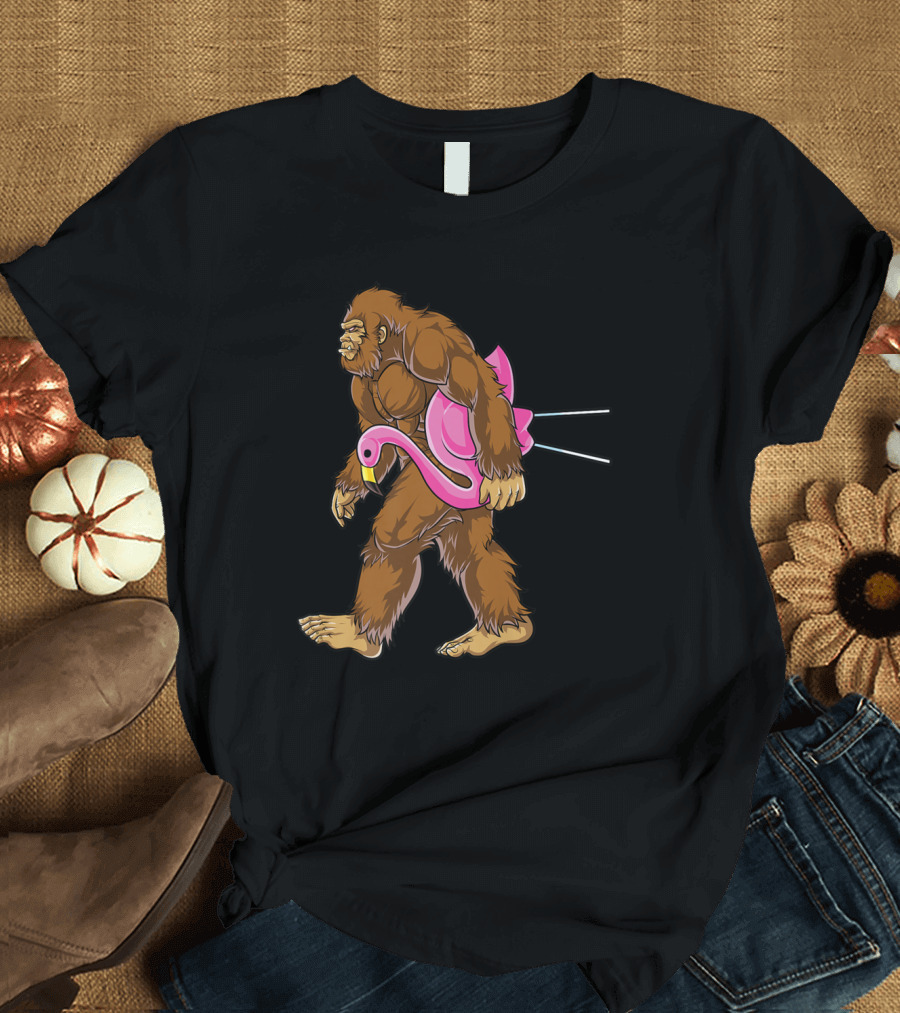 Bigfoot Sasquatch Carrying Pink Lawn Flamingo Funny Scene T-Shirt